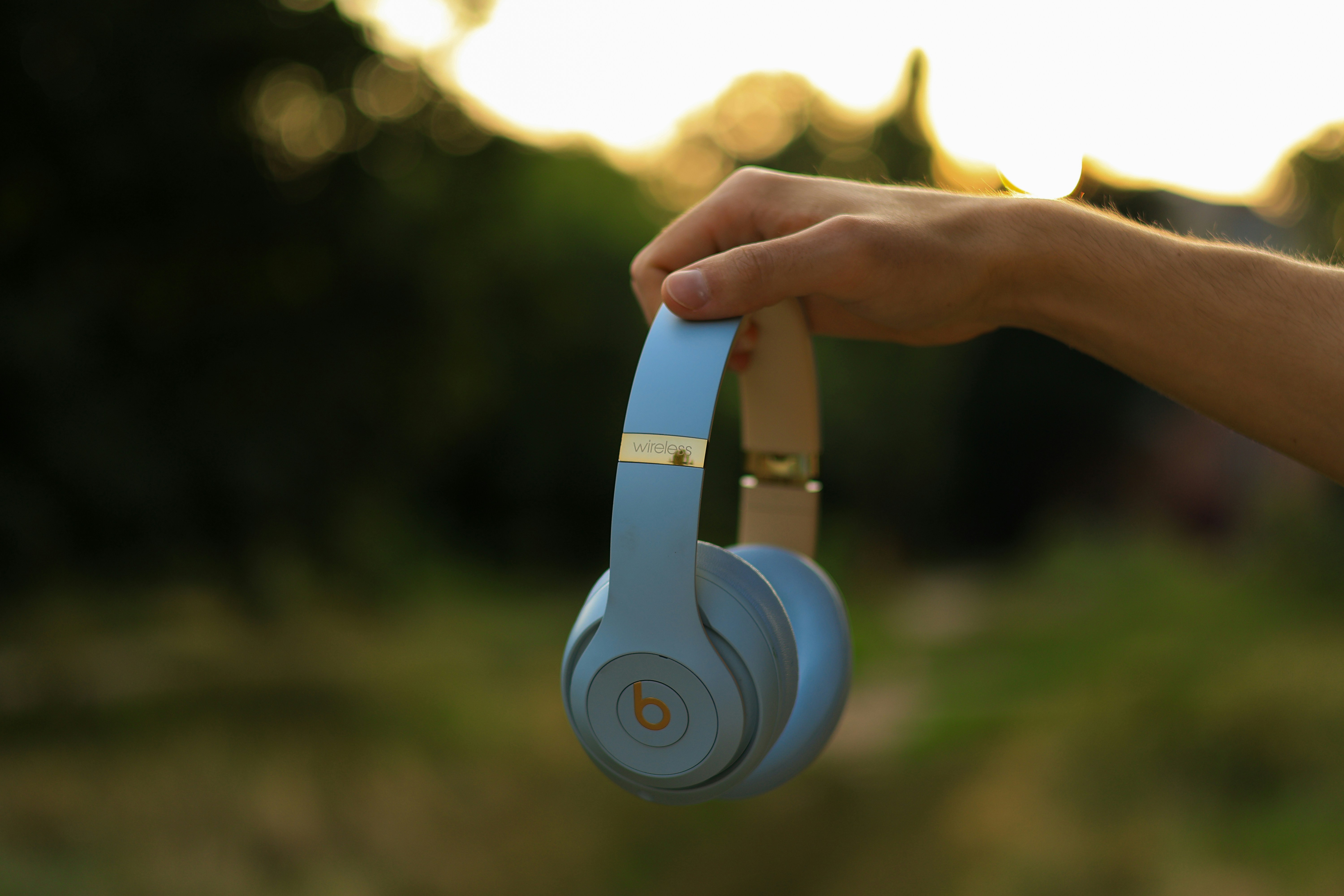 man holding headphones