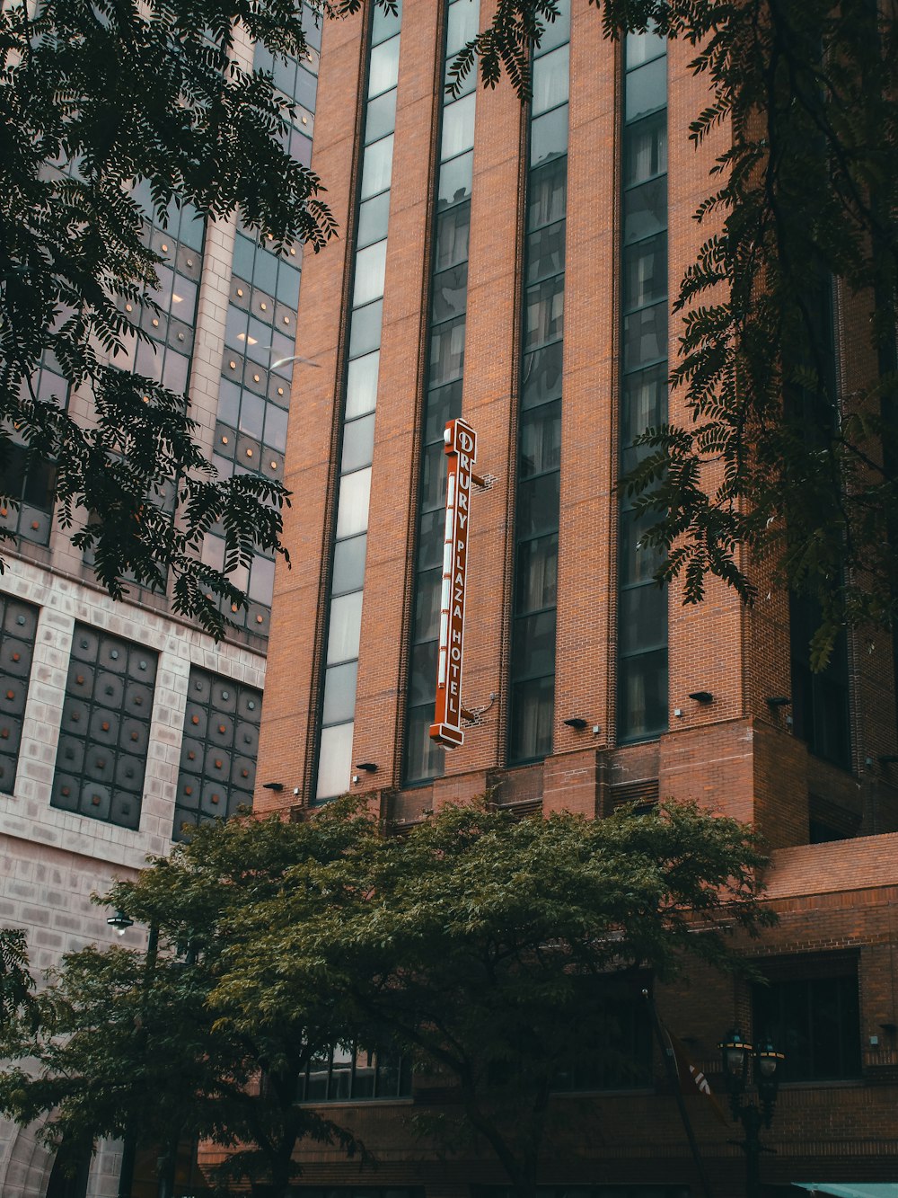 a tall building with a sign on the side of it