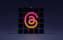 Minimalist pink and black digital art symbolizing media innovation.