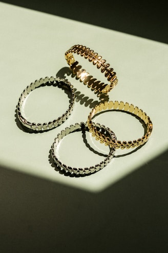 a group of three rings sitting on top of a table