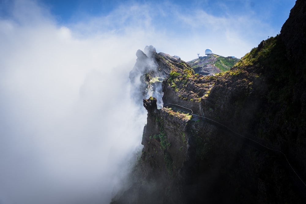 a very tall mountain with a very long rope