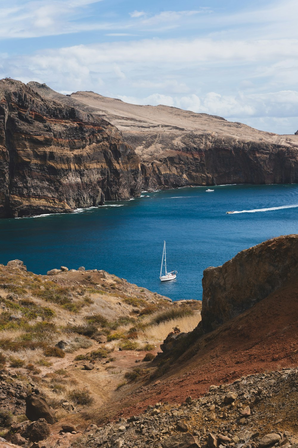 a sailboat in a large body of water