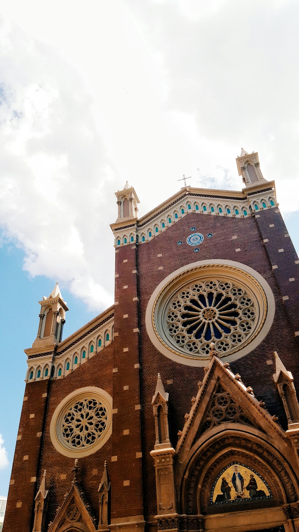 a large church with a clock on the front of it