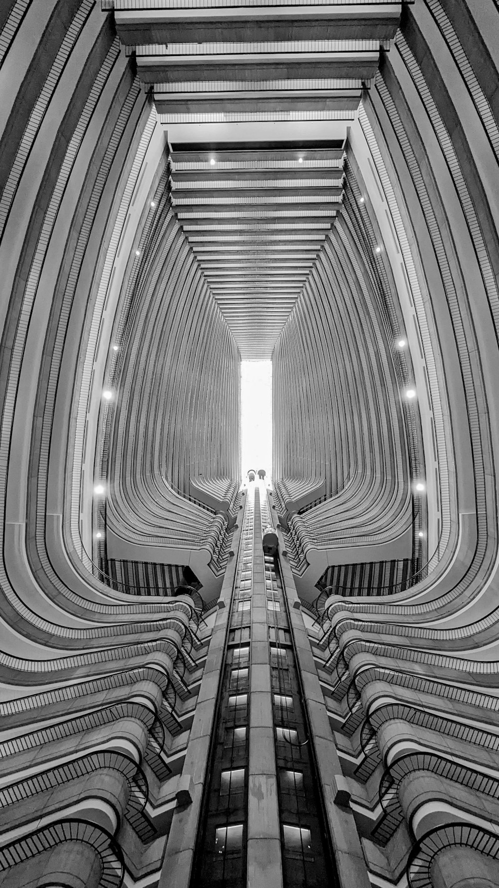 a black and white photo of a train station