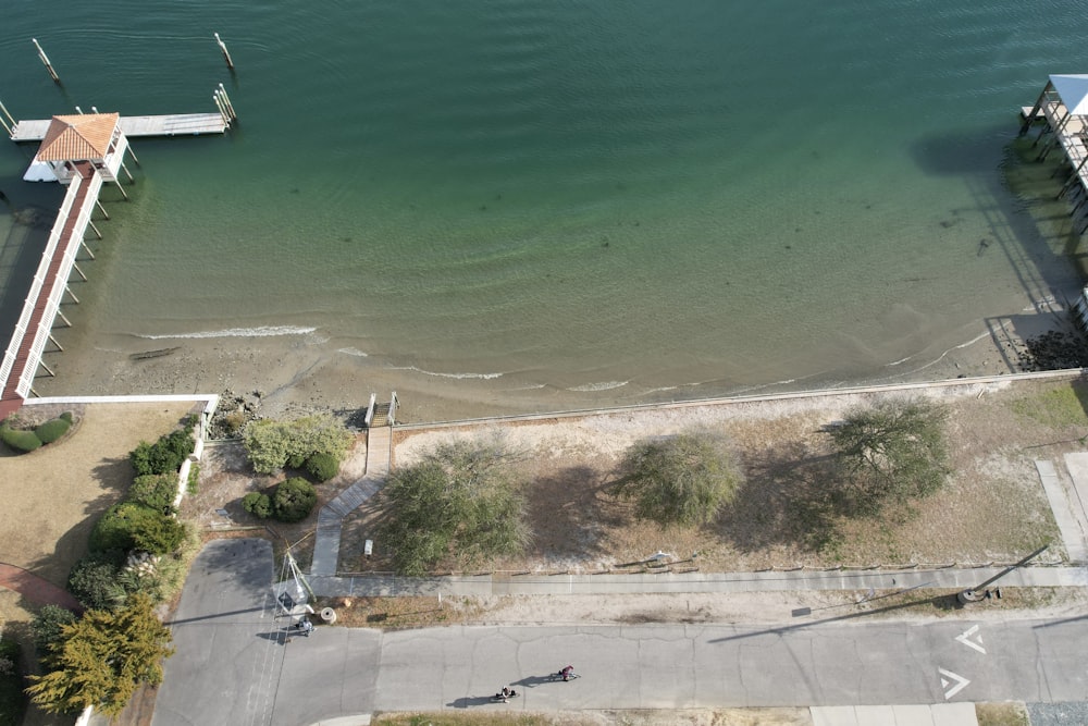 a large body of water next to a pier