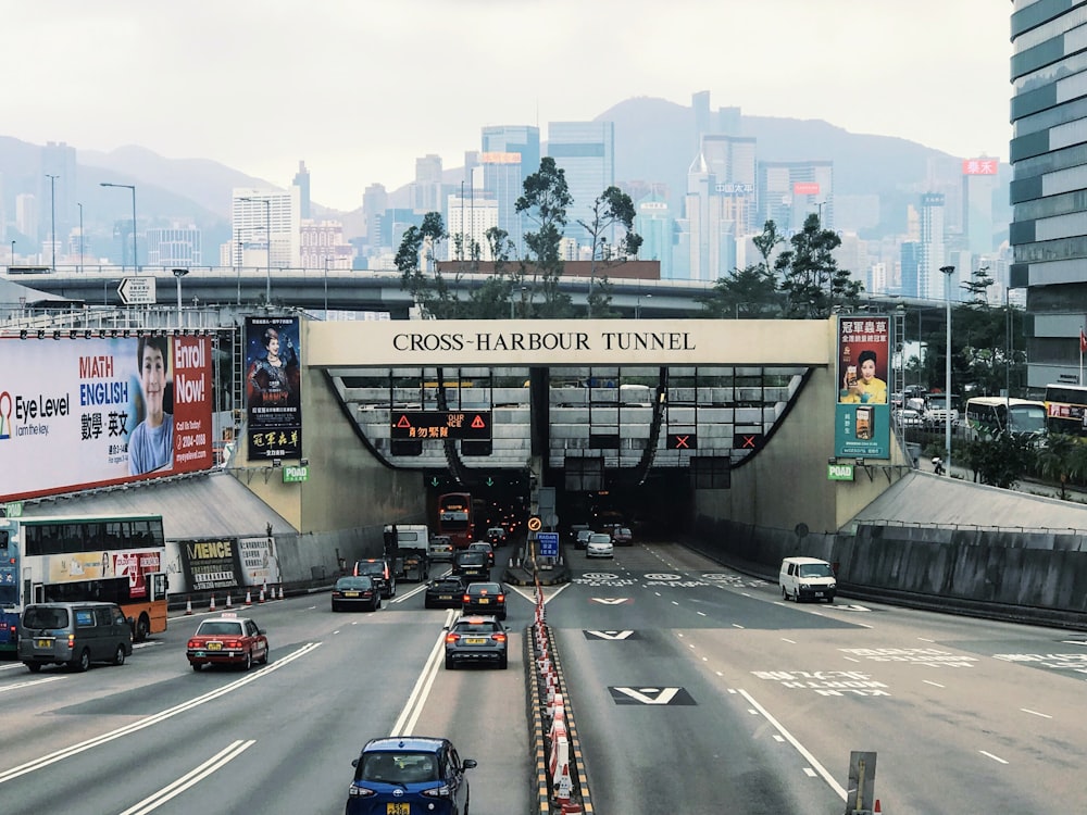 a busy city street with cars and trucks on it