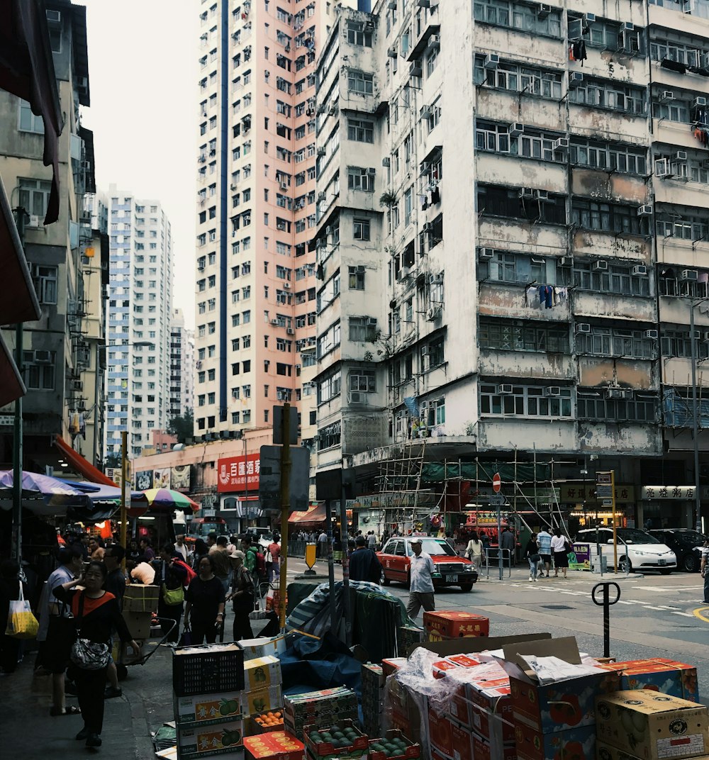 a busy city street filled with lots of tall buildings