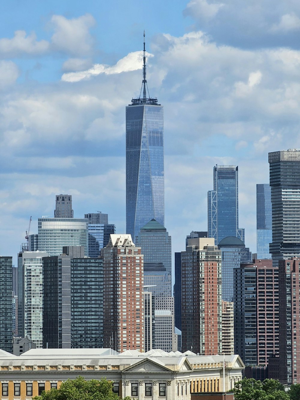 a view of a large city with tall buildings