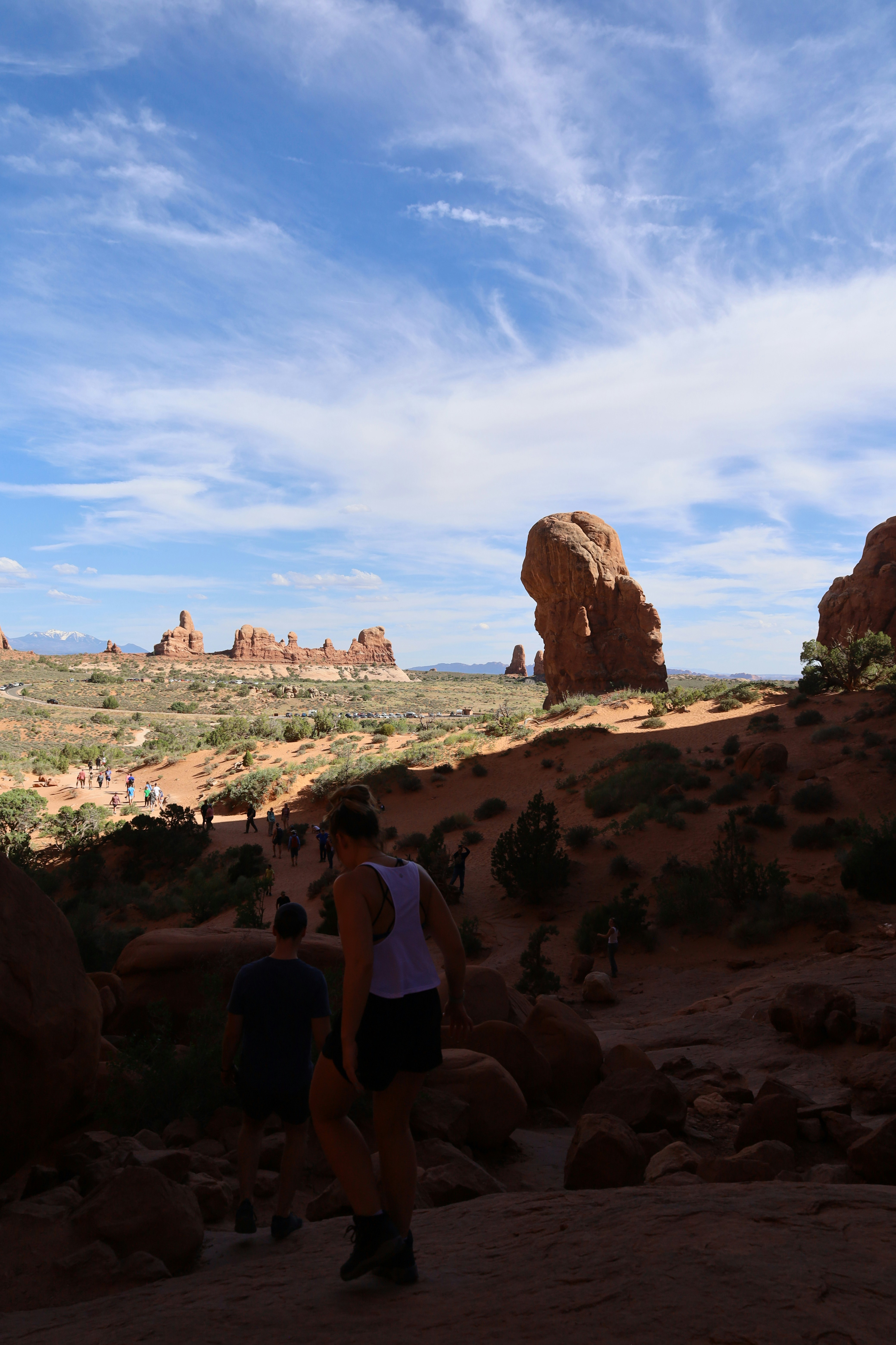 a couple of people that are standing in the dirt