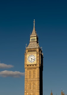 a tall clock tower with a sky background