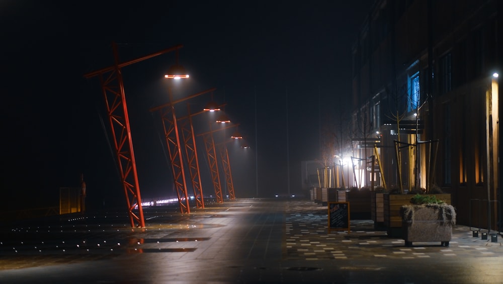 a row of street lights on a city street