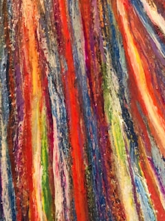 Close-up of vibrant oil paint strokes on canvas