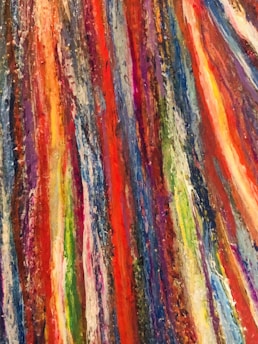 Close-up of vibrant oil paint strokes on canvas