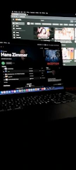 Dark-themed browse page with genre and mood filters.