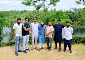 a group of men standing next to each other