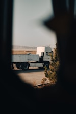 a truck is parked on the side of the road