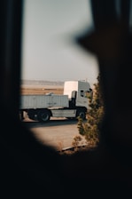 a truck is parked on the side of the road