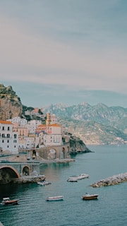 a body of water with boats floating on top of it