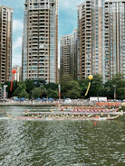 A vibrant dragon boat team paddling fiercely during a sunrise race.