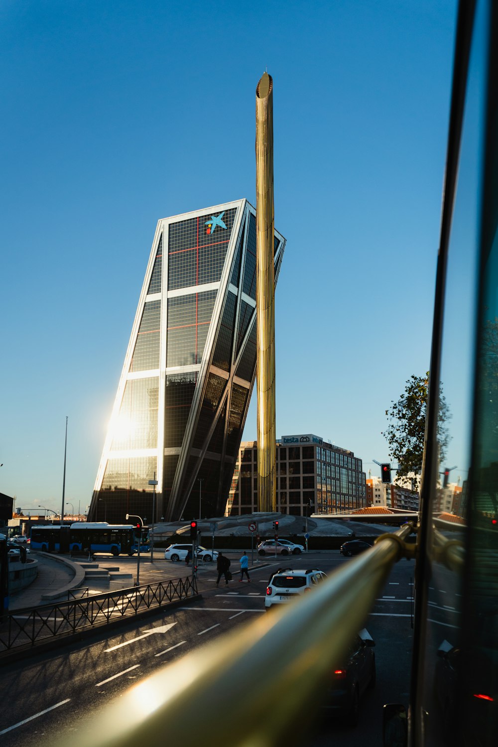 a tall building sitting on the side of a road