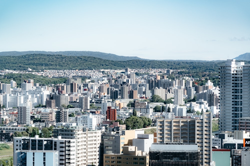 a view of a city with tall buildings