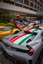 a group of cars parked next to each other on a street