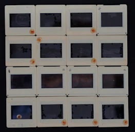 A neat grid of fifteen diverse images, each with a clear 'click here' button overlay.