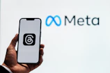 An engaging social media campaign display on a smartphone with Meta ads insights.