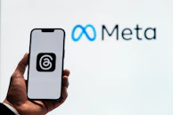 An engaging social media campaign display on a smartphone with Meta ads insights.
