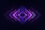 a dark background with a purple geometric design