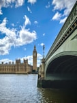 the big ben clock tower towering over the city of london
