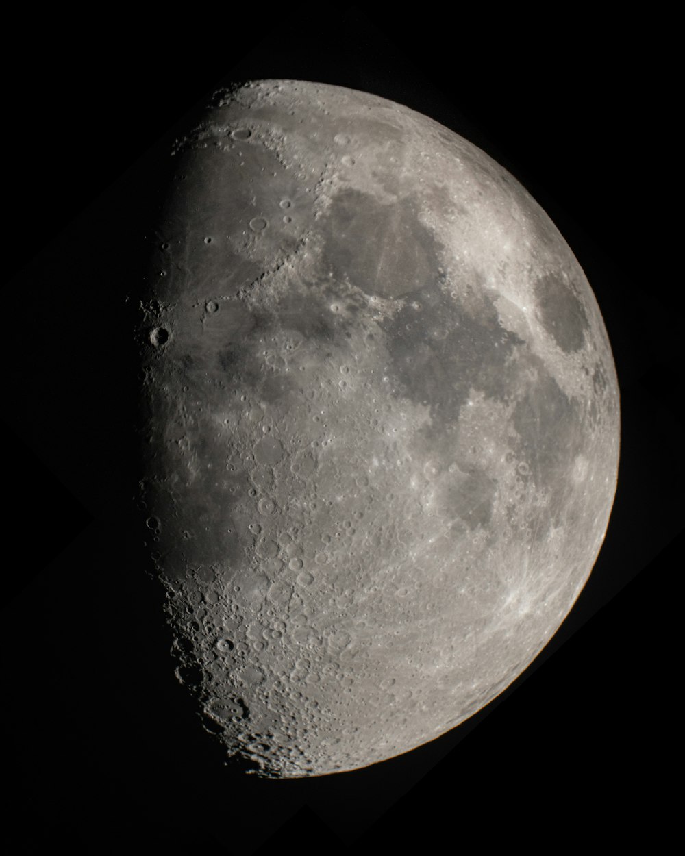 a close up of the moon in the dark sky