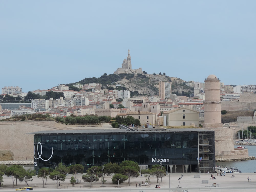 a view of a city with a hill in the background