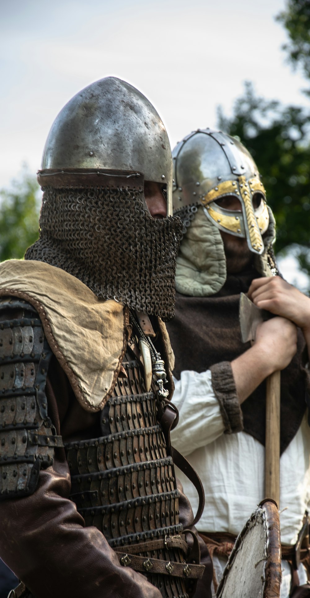 a couple of people that are wearing helmets