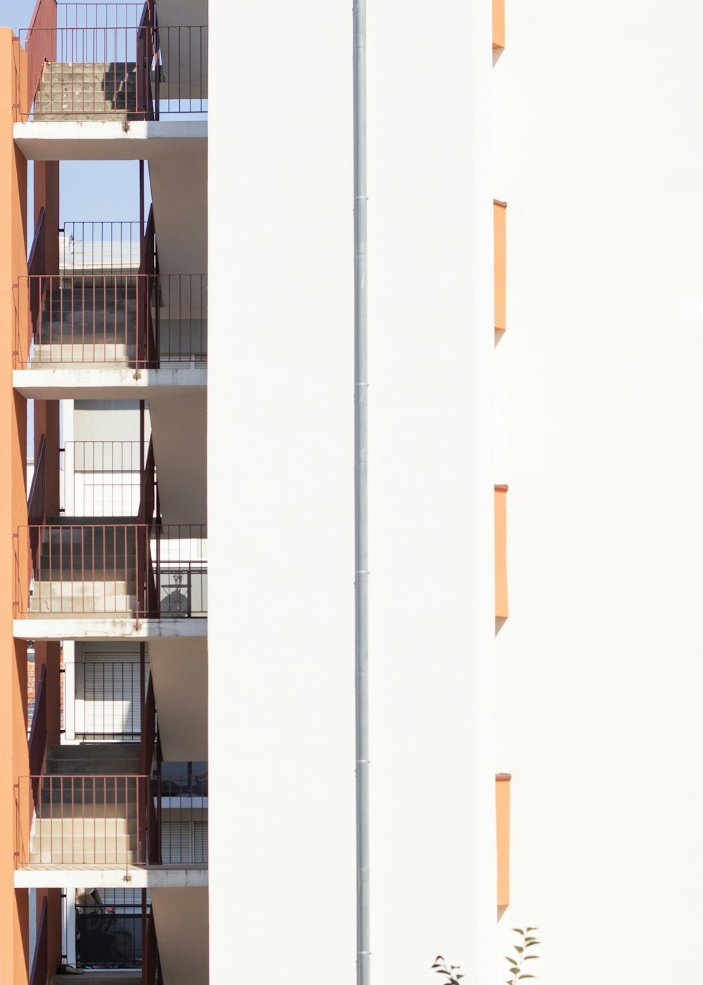 a tall building with balconies and balconies on the balconies