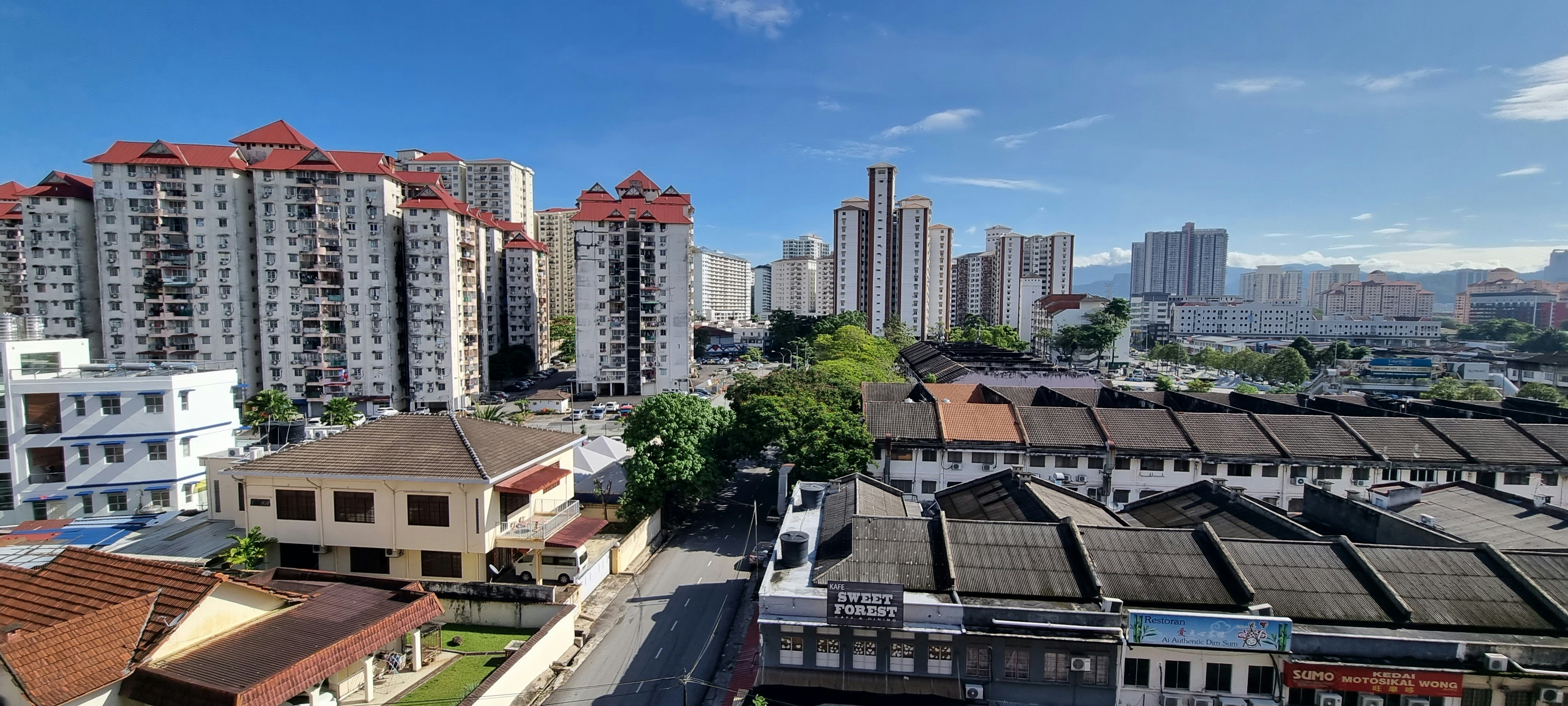a view of a city with tall buildings
