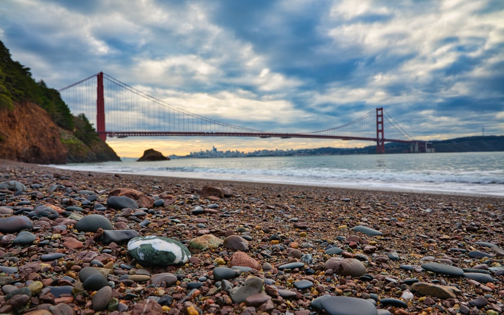 a view of the golden gate bridge from the beach