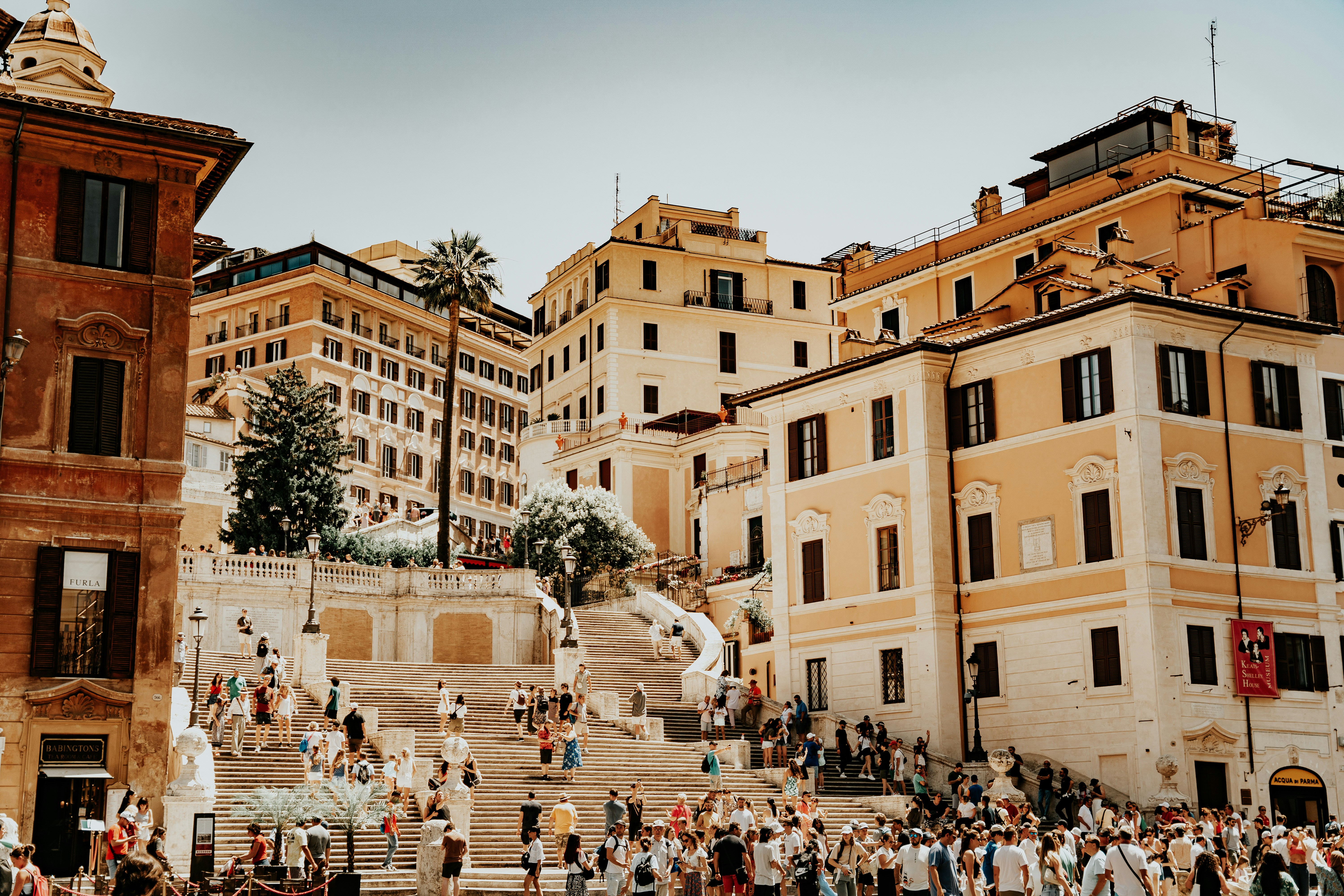 a group of people walking up and down some steps
