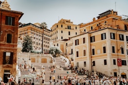 A scenic European city square bustling with tourists blending into local cultural festivities.