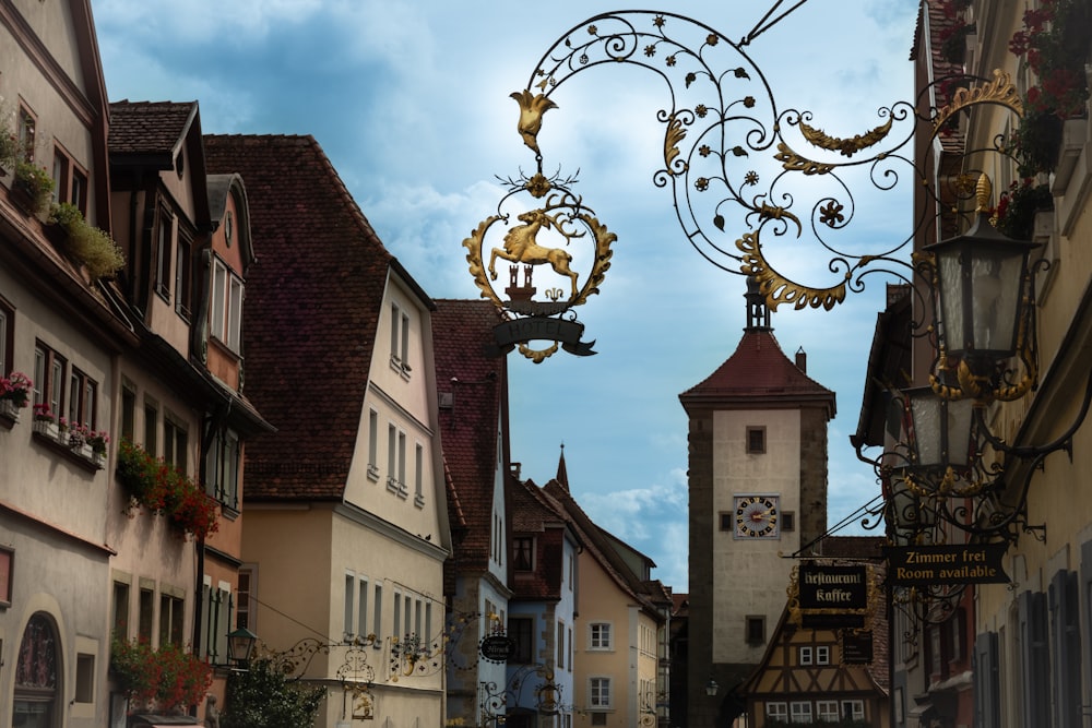 a street with a clock tower in the middle of it