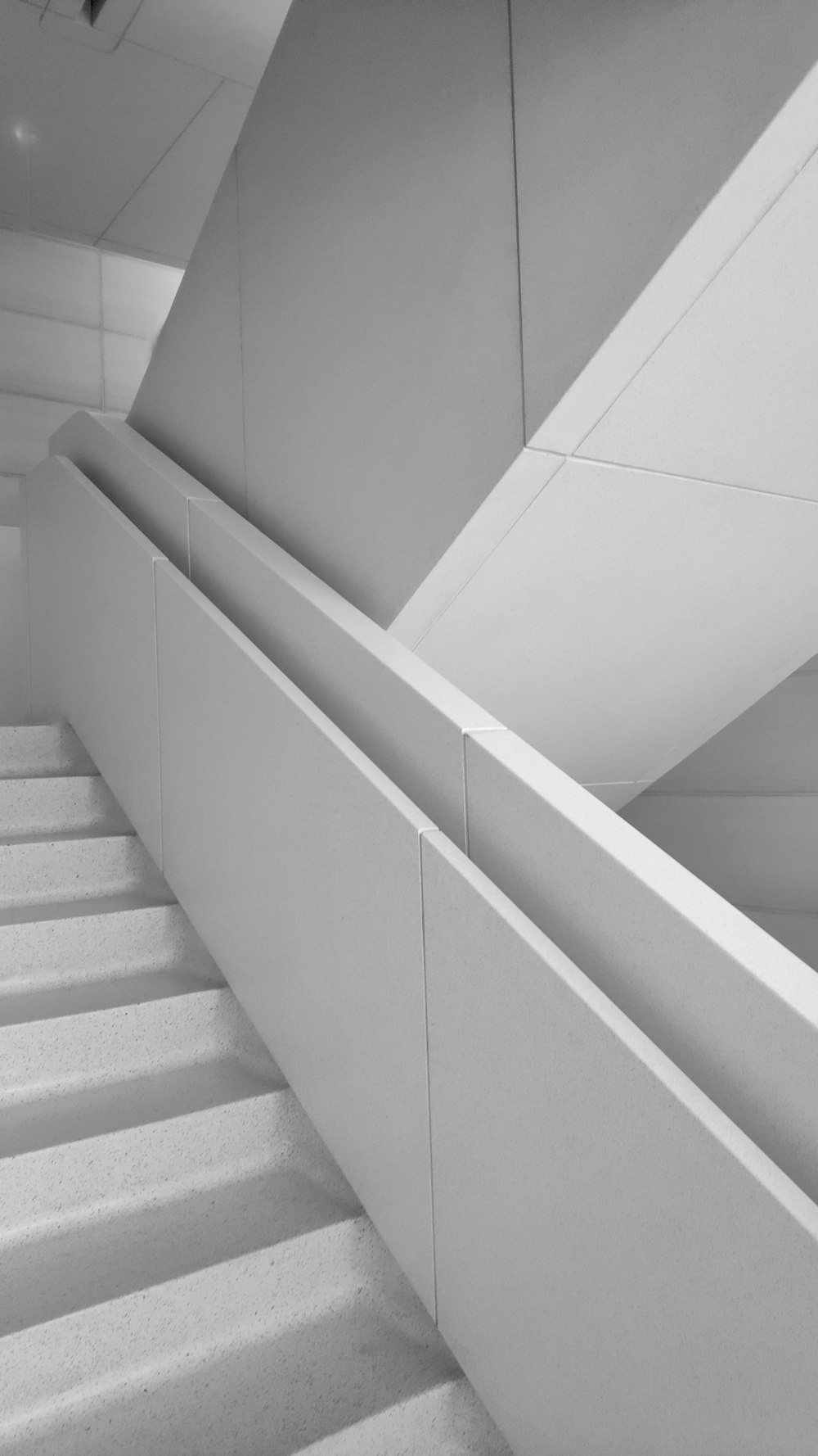 a black and white photo of some stairs