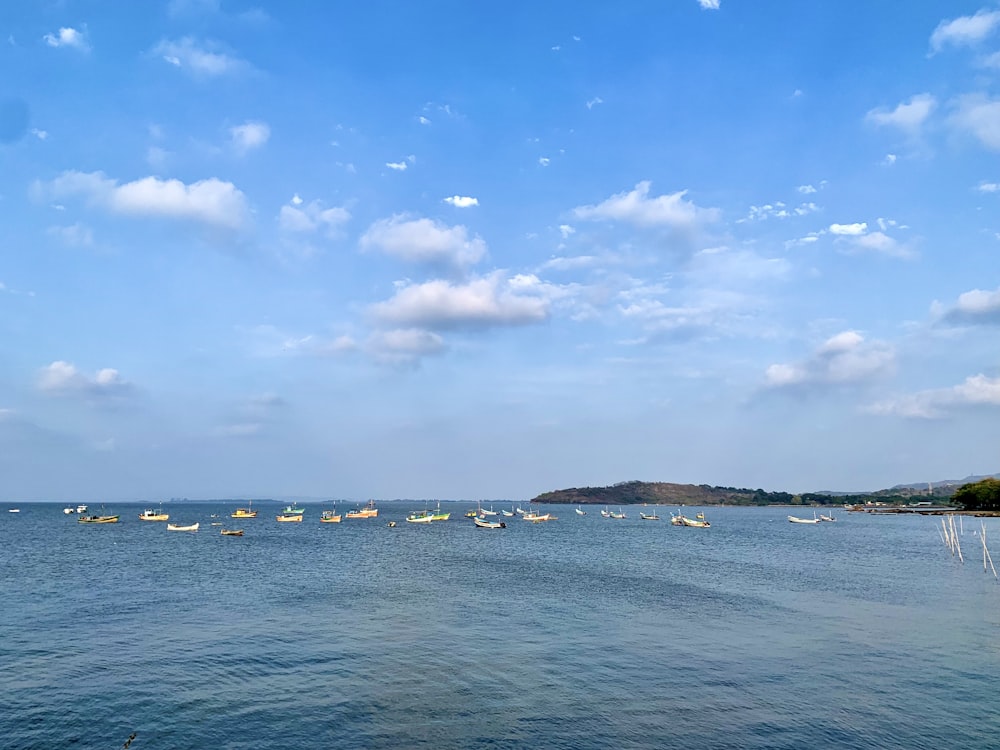 a large body of water with boats floating on it