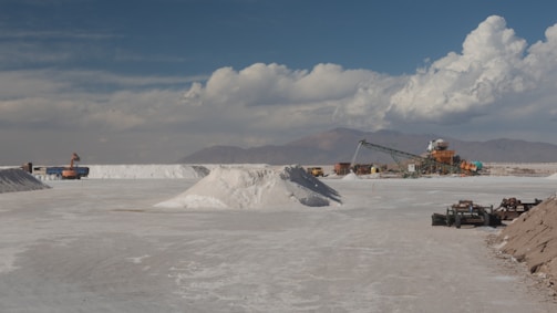 a large pile of dirt sitting in the middle of a desert