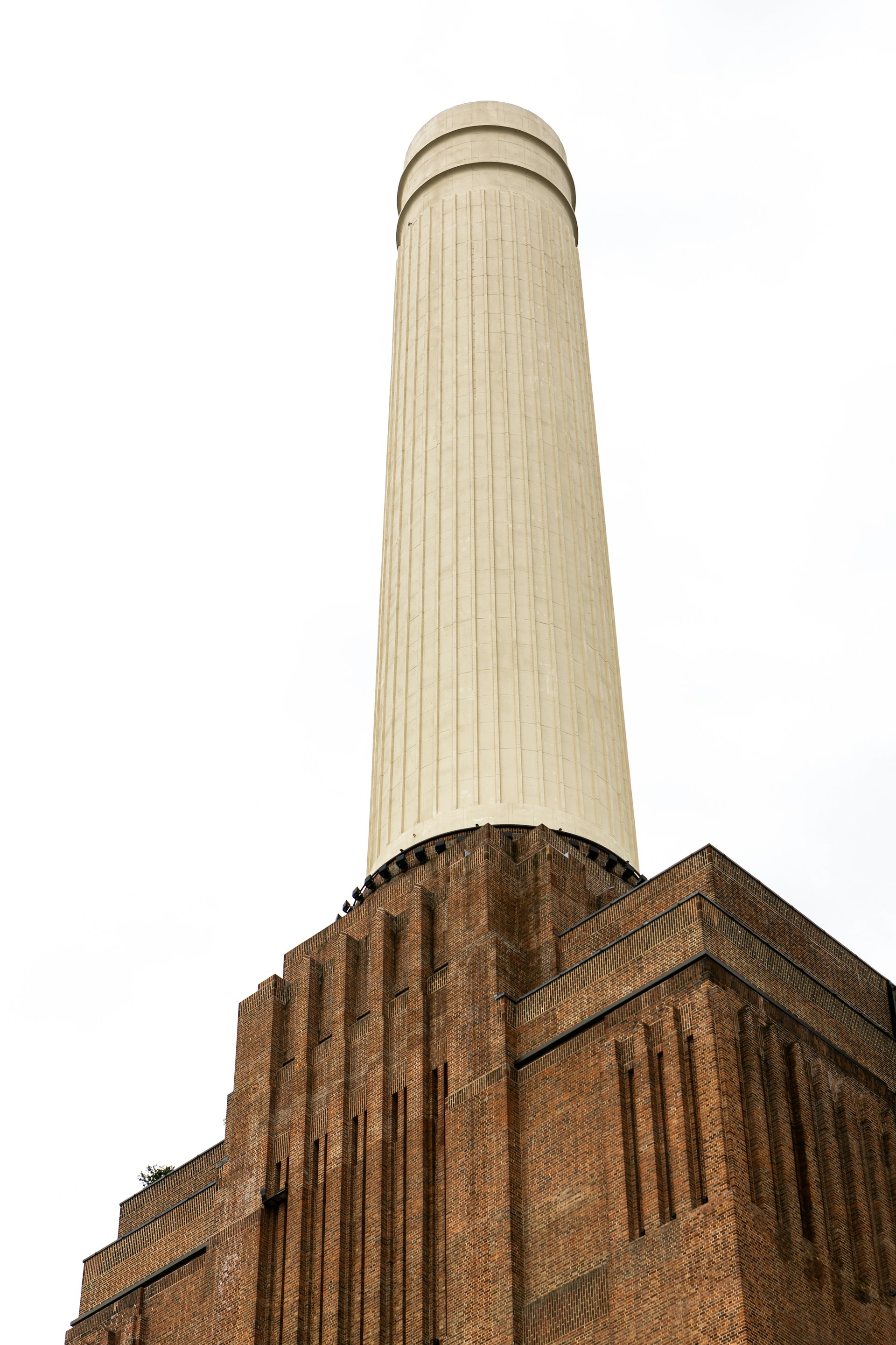woman wearing yellow long-sleeved dress under white clouds and blue sky during daytime
