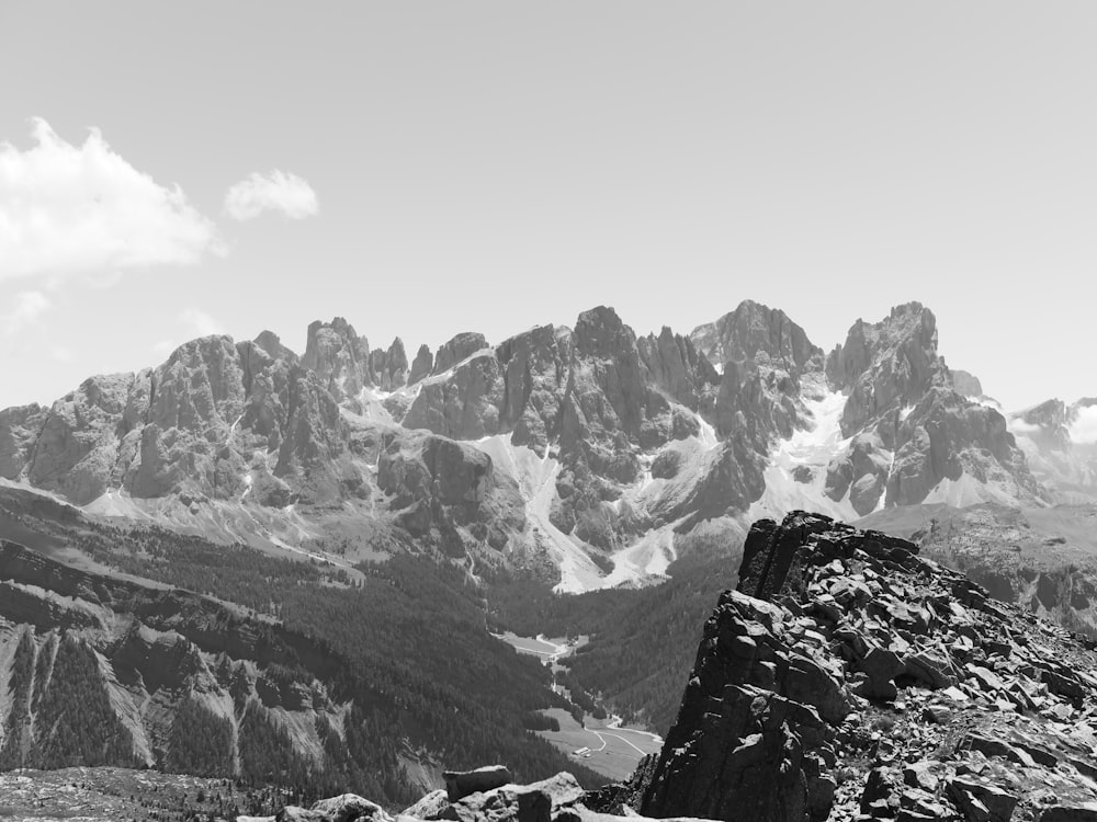 a black and white photo of a mountain range