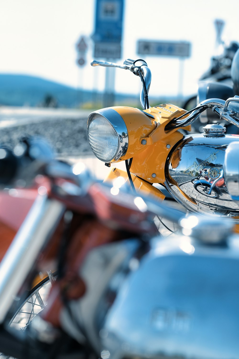 a row of motorcycles parked next to each other