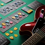 A collection of various guitar picks arranged artistically on a table.