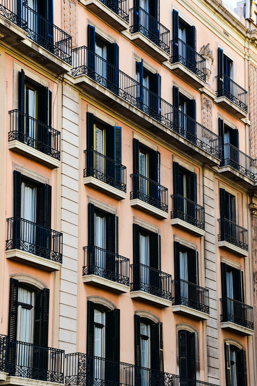 a tall building with balconies and balconies on it