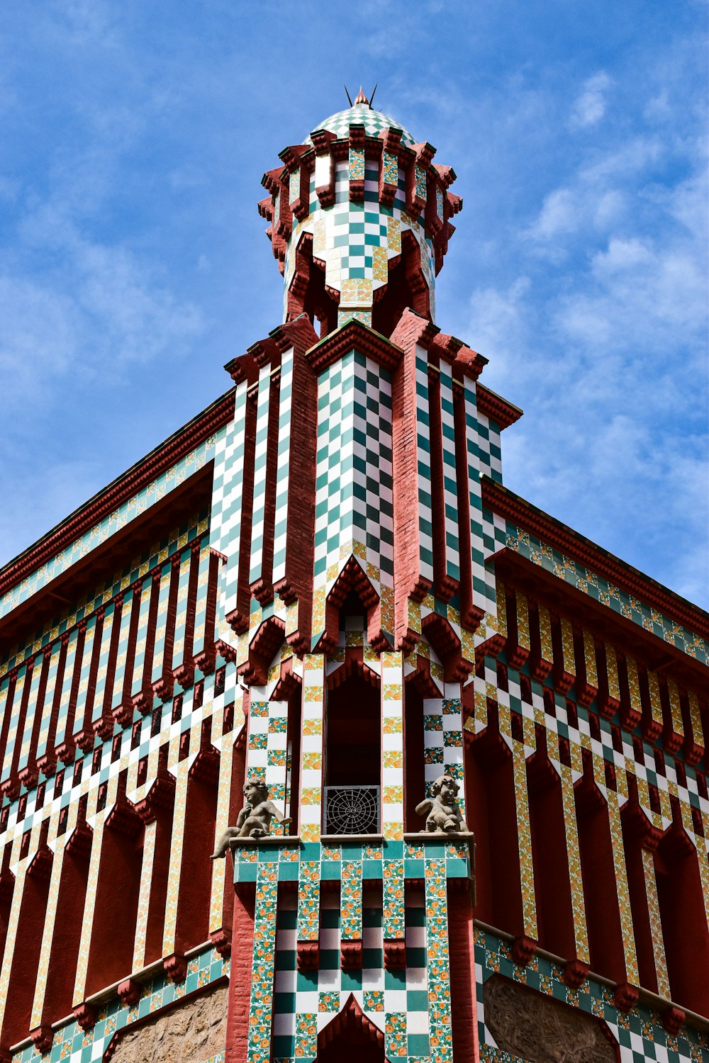 a tall building with a clock on the top of it