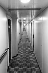 Hallway leading to multiple rooms in the accommodation
